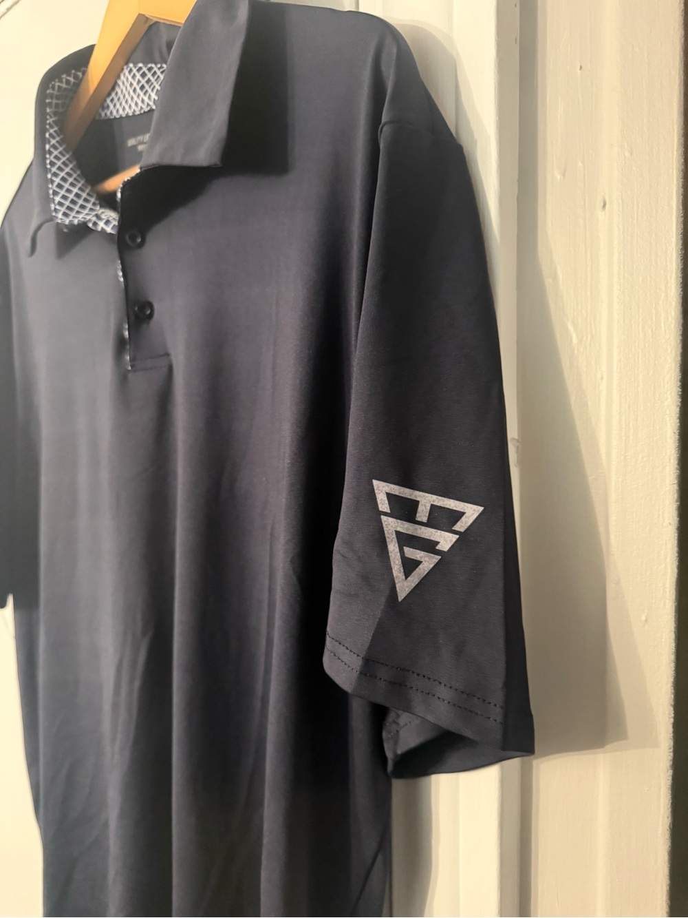 Men's Black Polo with Geometric Sleeve Accent
